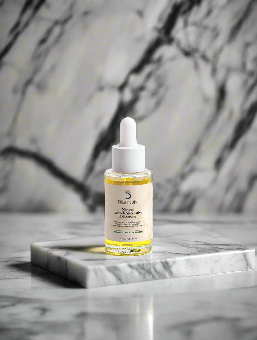 Eclat Soin Natural Retinol-Alternative Oil Serum in a glass dropper bottle on a marble surface